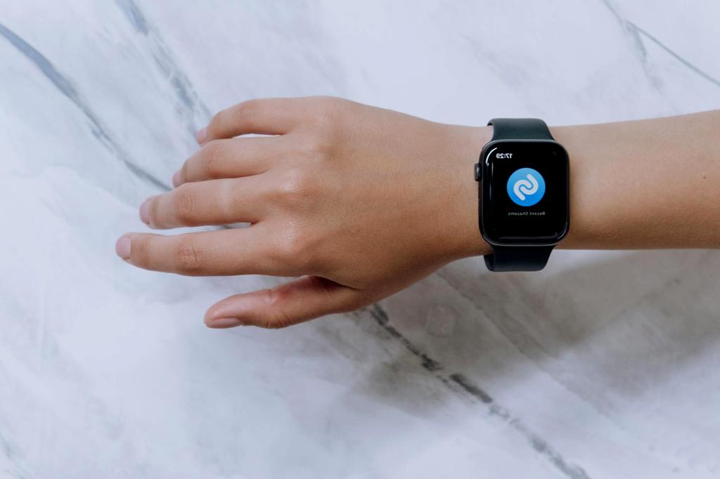 iPhone with Spotlight and Siri interfaces